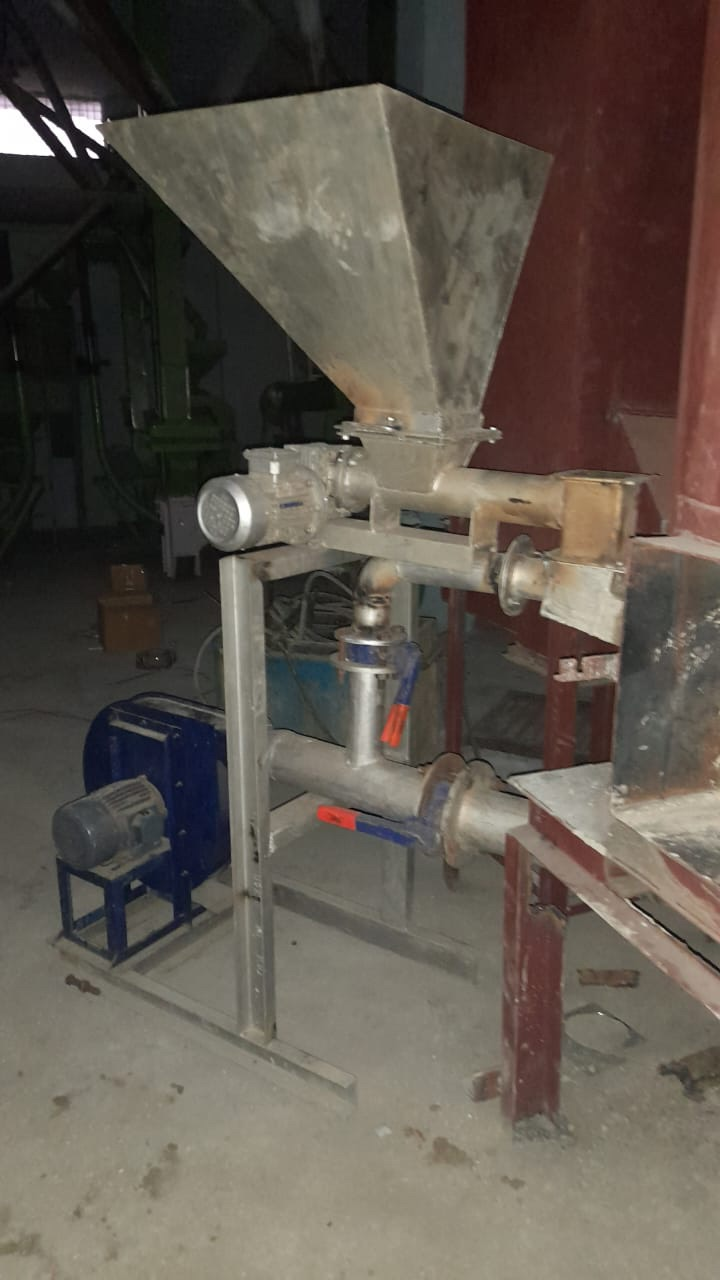 Close view of the mRECS fuel hopper, screw feeder and air blower